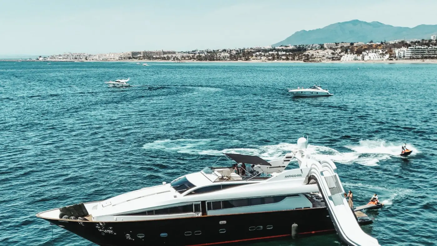 Antago 90 Venus at anchor with water slide and jet skis alongside