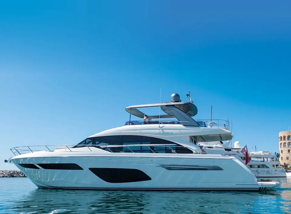 Princess F70 Amante docked in Puerto Banús under a blue sky