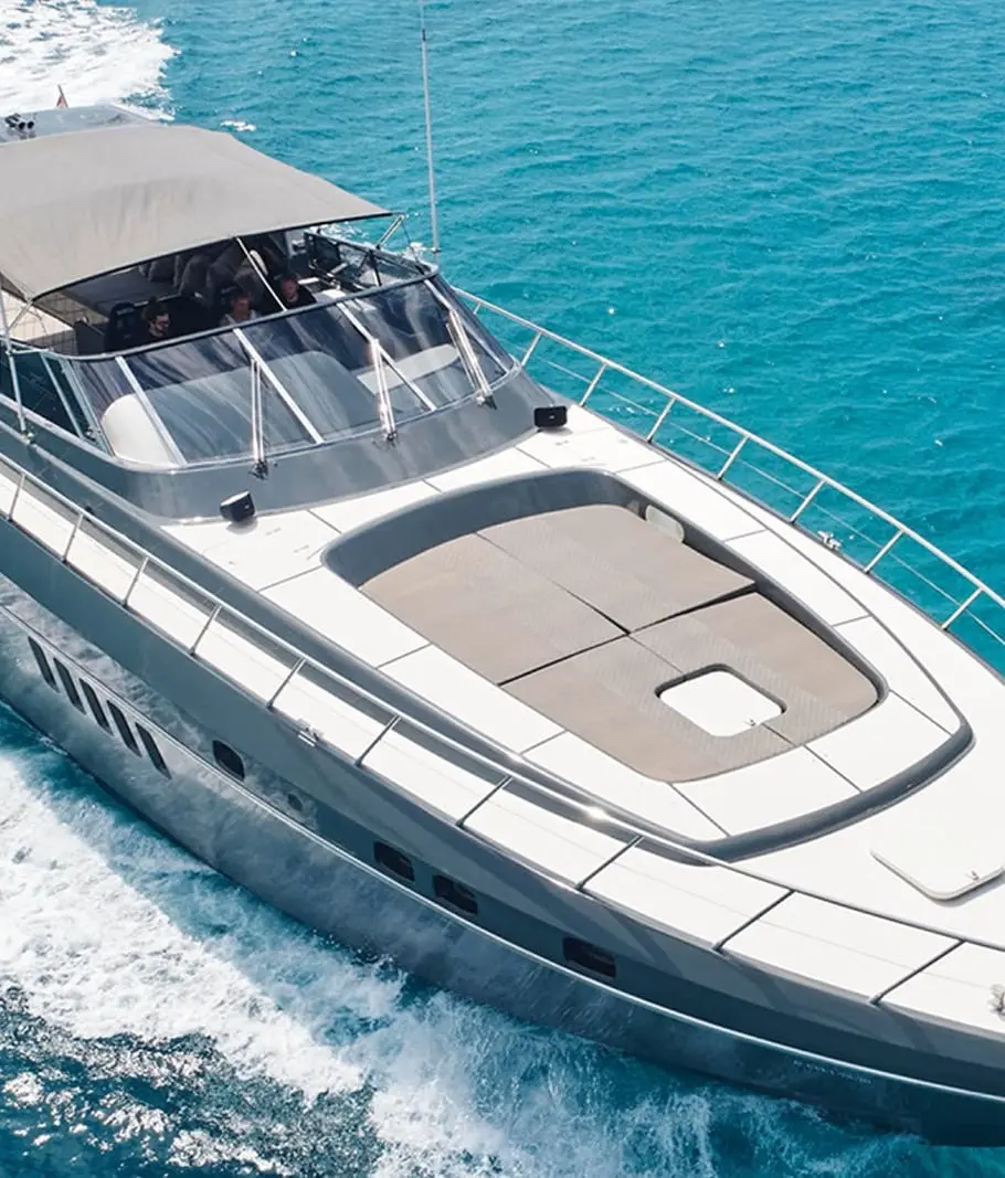 Aerial view of the bow of Mangusta 80 Happy Hour under way