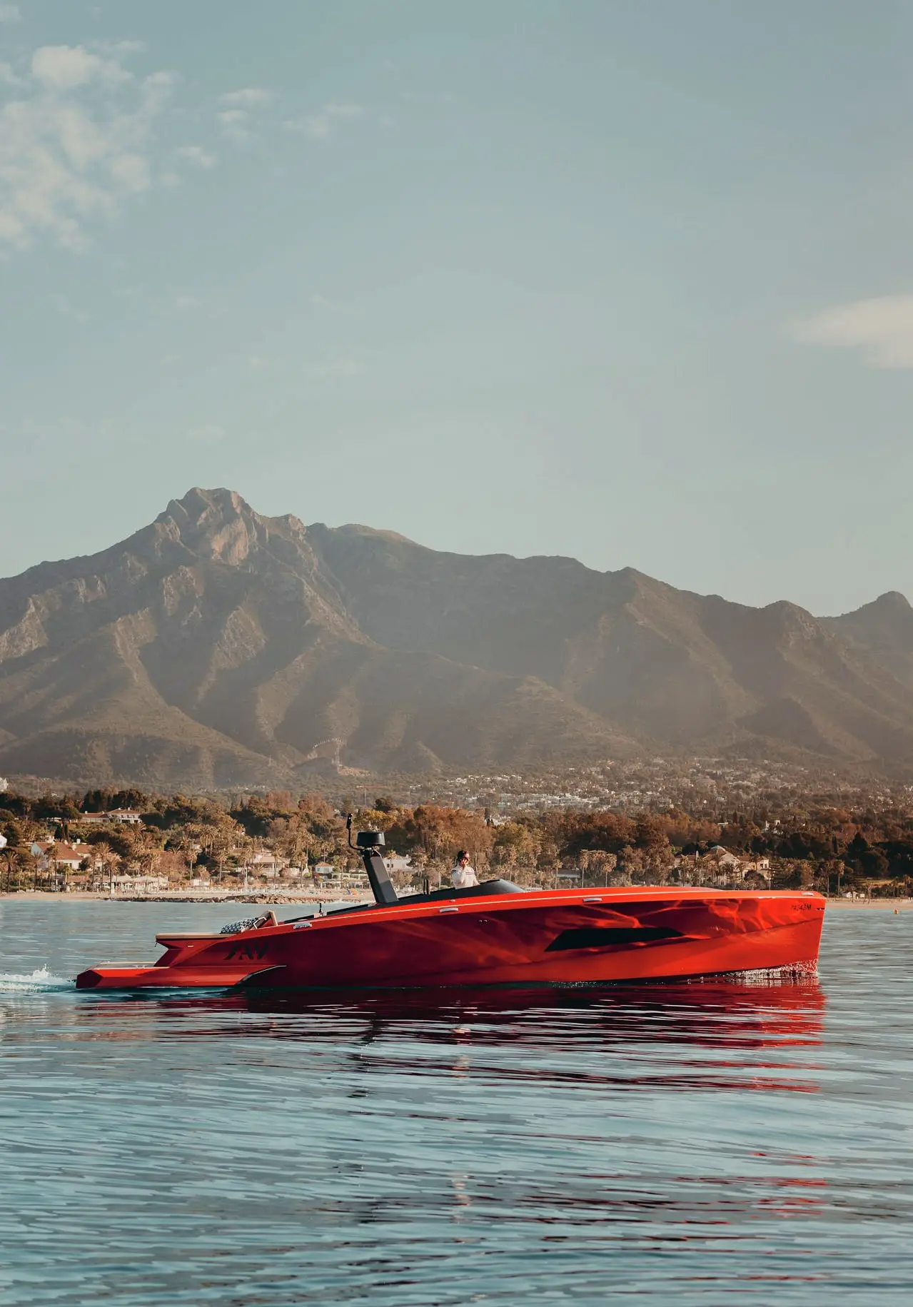 SAY 42 Andalusi cruising off Marbella, mountains behind