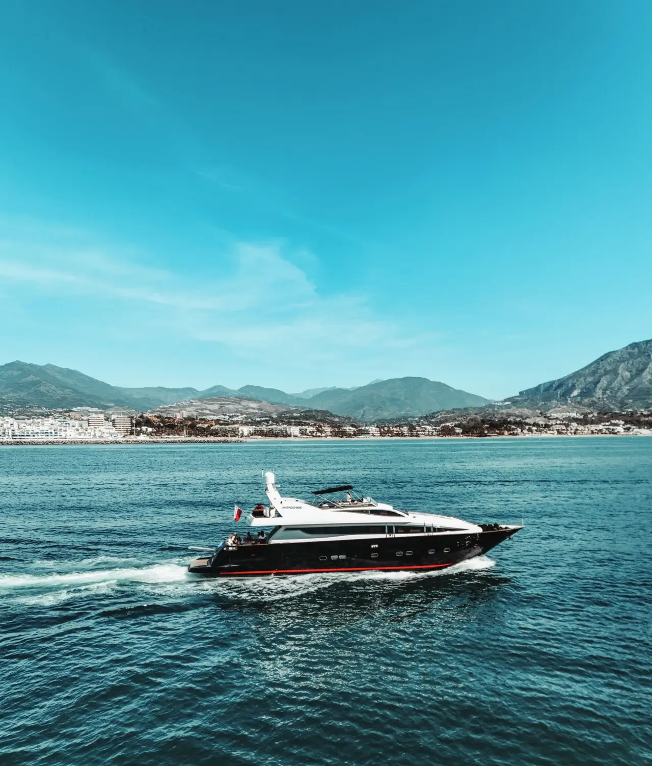 Antago 90 Venus cruising along the Costa del Sol, mountains behind