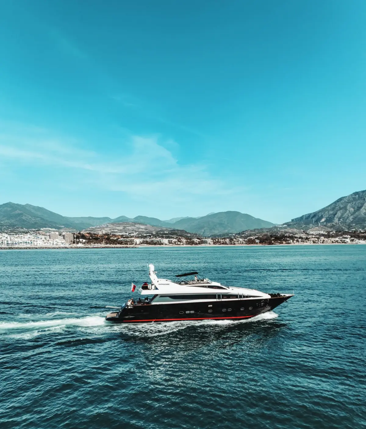 Antago 90 Venus cruising along the Costa del Sol, mountains behind
