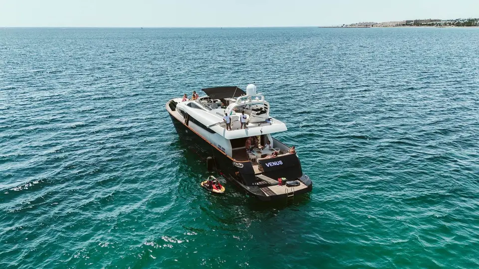 Aerial view of Venus from astern with a jet ski at the platform