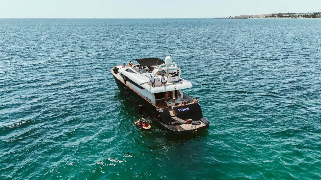 Aerial view of Venus from astern with a jet ski at the platform