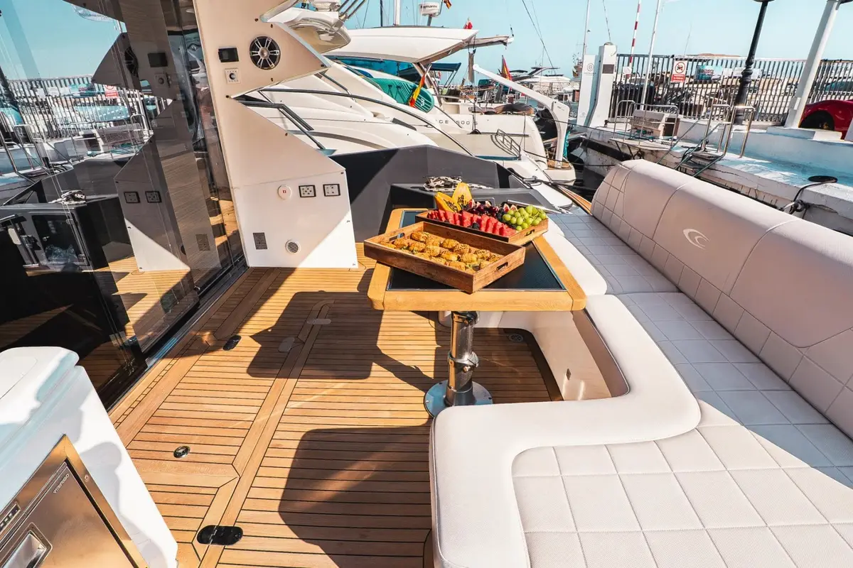Shaded lounge seating on the aft deck of Cobrey 50 Fly Swederm