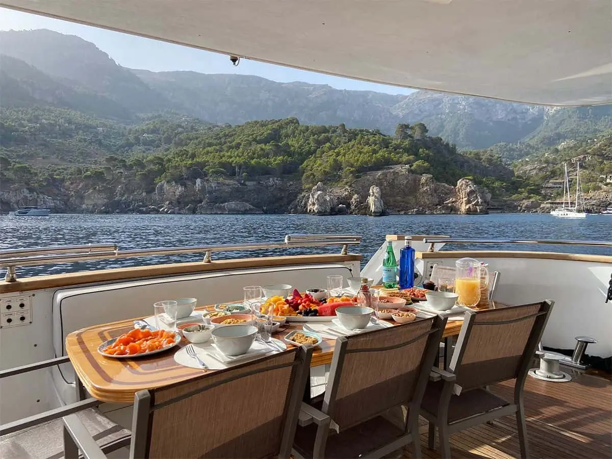 Aft deck table set for breakfast at anchor